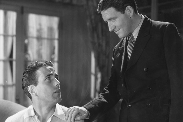 بوگارت در کنار اسپنسر تریسی در فیلم «بالای رودخانه» (۱۹۳۰)